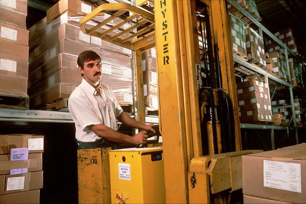 A person sorting packages